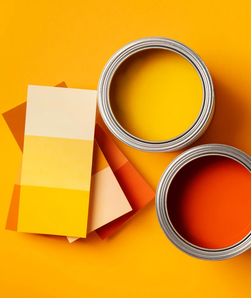 flat-lay-cans-with-orange-yellow-paint-1000w